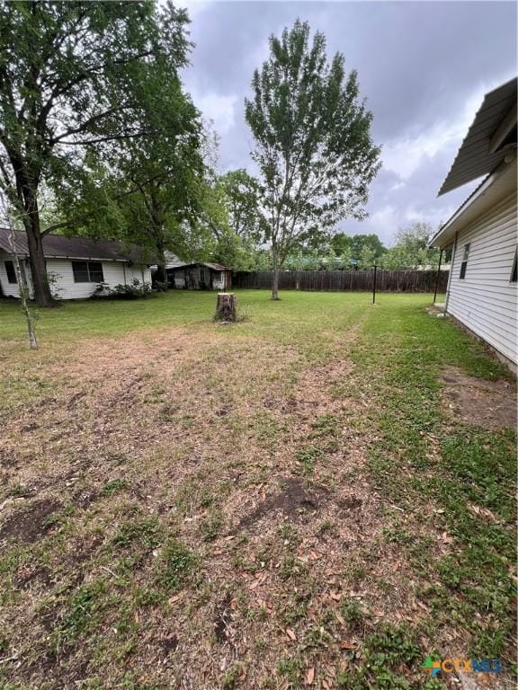 view of yard with fence