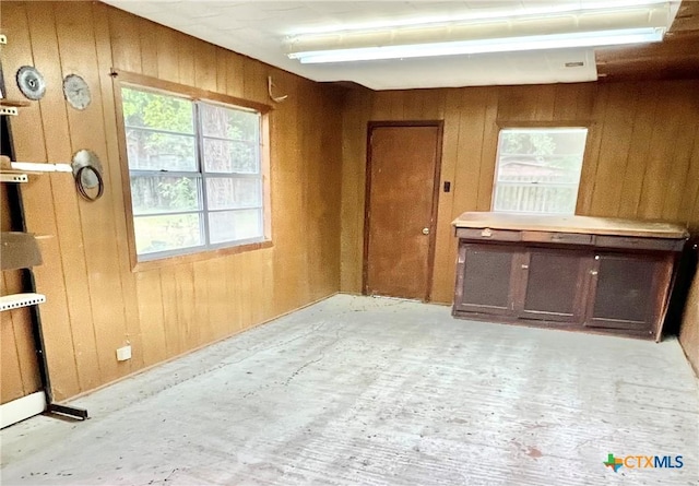 empty room with wooden walls