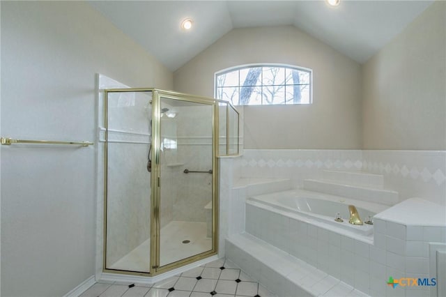 bathroom featuring lofted ceiling and shower with separate bathtub