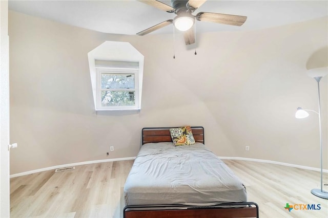 503 Rabbit Run Rd, Victoria, TX 77905 - bedroom with wood finished floors, baseboards, and ceiling fan