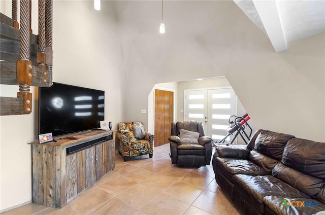 503 Rabbit Run Rd, Victoria, TX 77905 - living area featuring a high ceiling and light tile patterned floors