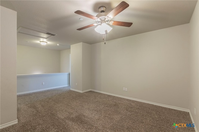 carpeted empty room with ceiling fan