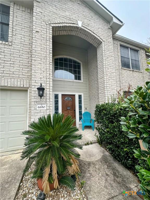 entrance to property with a garage