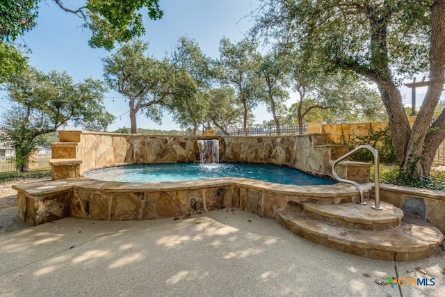 view of pool featuring pool water feature