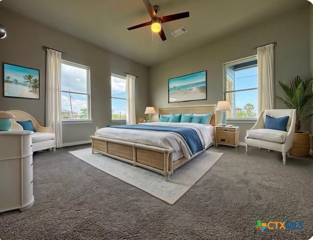 837 Swallow Dr, Palacios, TX 77465 - carpeted bedroom featuring baseboards, a ceiling fan, multiple windows, and visible vents