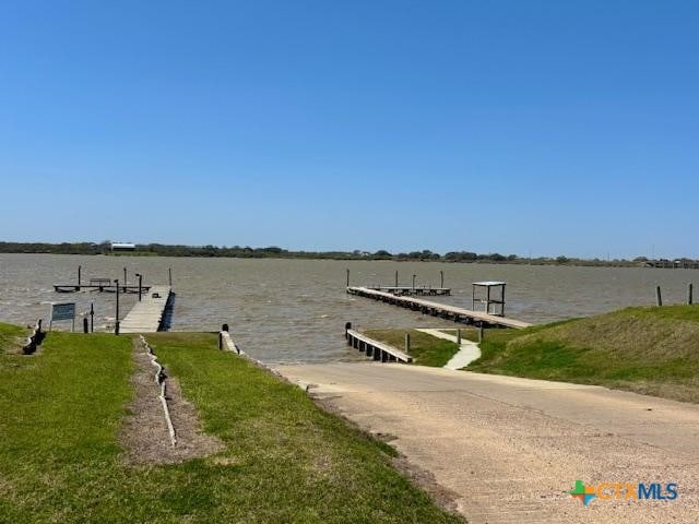 837 Swallow Dr, Palacios, TX 77465 - dock area featuring a water view