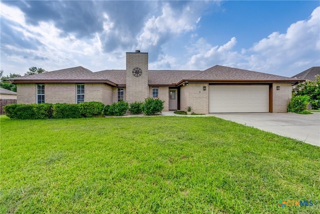 832 Saint James, Seguin, TX 78155 - ranch-style home featuring brick siding, a chimney, and a front lawn