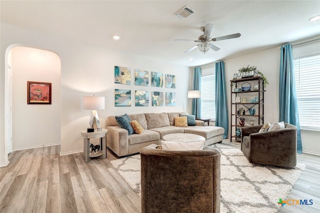 401 Thunder Valley Trl, Georgetown, TX 78626 - living room featuring arched walkways, healthy amount of natural light, ceiling fan, and recessed lighting
