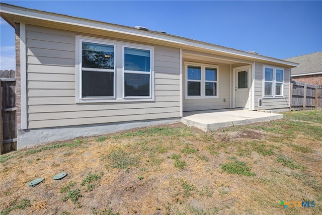 rear view of house with a patio area