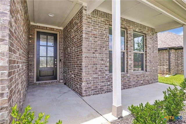 15651 Baronial Castle Dr, Humble, TX 77346 - property entrance with brick siding and covered porch