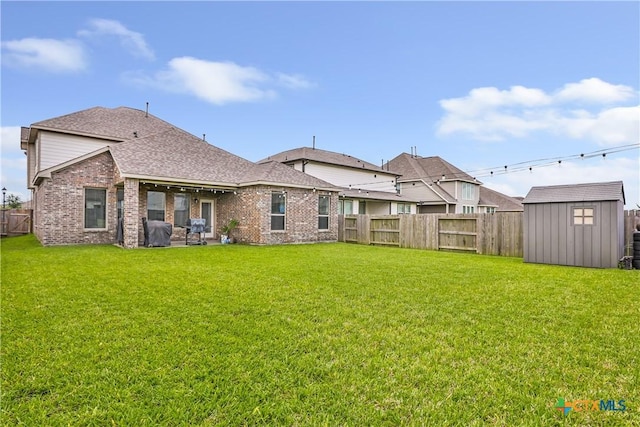 15651 Baronial Castle Dr, Humble, TX 77346 - rear view of property featuring brick siding, a shed, a fenced backyard, and roof with shingles