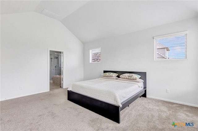 15651 Baronial Castle Dr, Humble, TX 77346 - bedroom featuring carpet flooring, lofted ceiling, and multiple windows