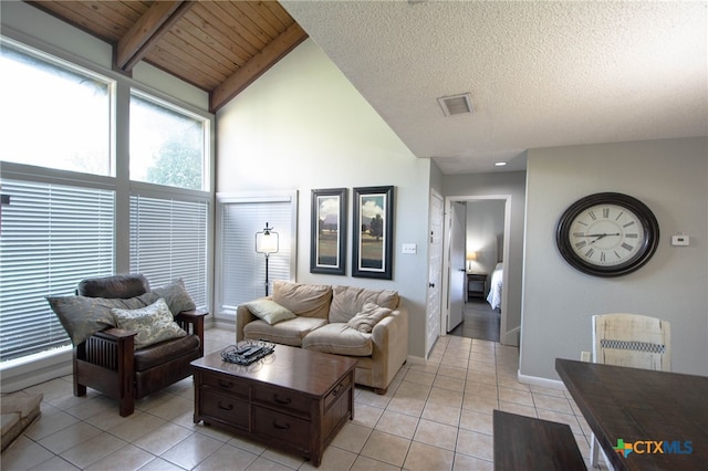 tiled living room featuring high vaulted ceiling and wooden ceiling