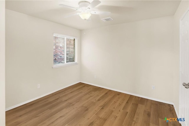 6402 Ambrose Cir, Temple, TX 76502 - empty room featuring wood finished floors and a ceiling fan