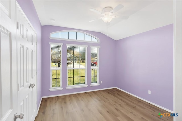 6402 Ambrose Cir, Temple, TX 76502 - unfurnished room with lofted ceiling, a ceiling fan, and wood finished floors