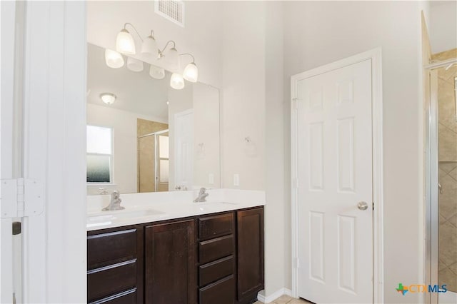 6402 Ambrose Cir, Temple, TX 76502 - bathroom with a shower stall and double vanity