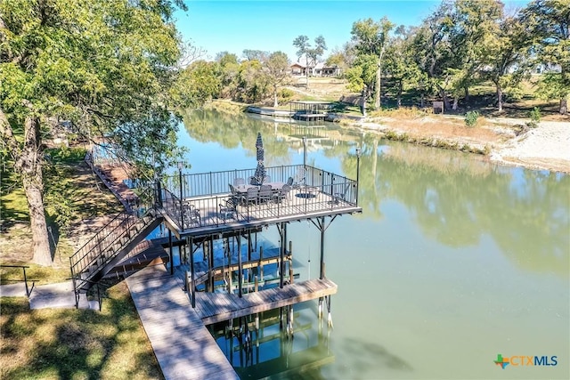 dock area featuring a water view