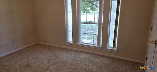 view of carpeted spare room