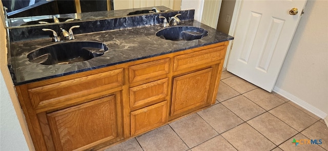 bathroom featuring tile patterned floors and sink