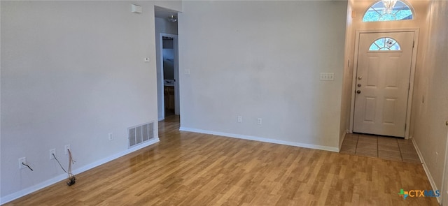 foyer entrance featuring light wood-type flooring