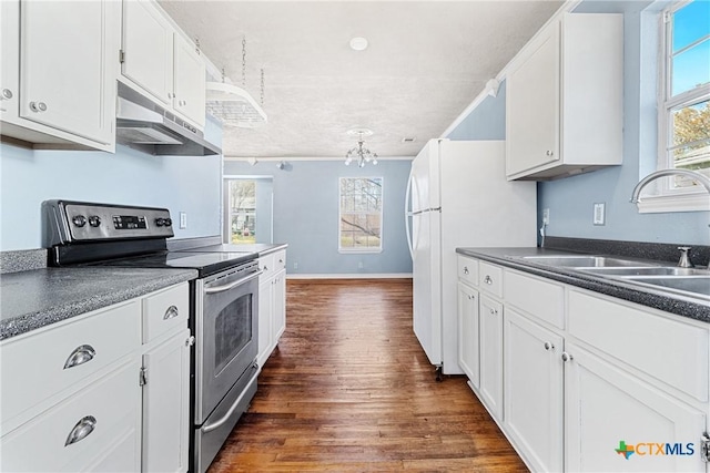 kitchen with white cabinetry, plenty of natural light, sink, and stainless steel electric range