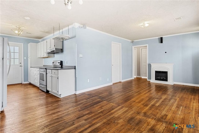 unfurnished living room with ornamental molding, a textured ceiling, and dark hardwood / wood-style flooring