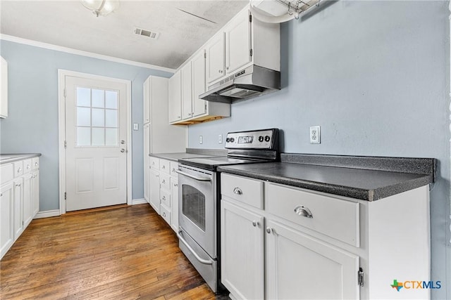 kitchen with white cabinetry, dark hardwood / wood-style floors, crown molding, and electric range