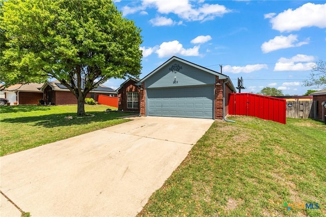 single story home featuring fence, concrete driveway, brick siding, a front yard, and a garage