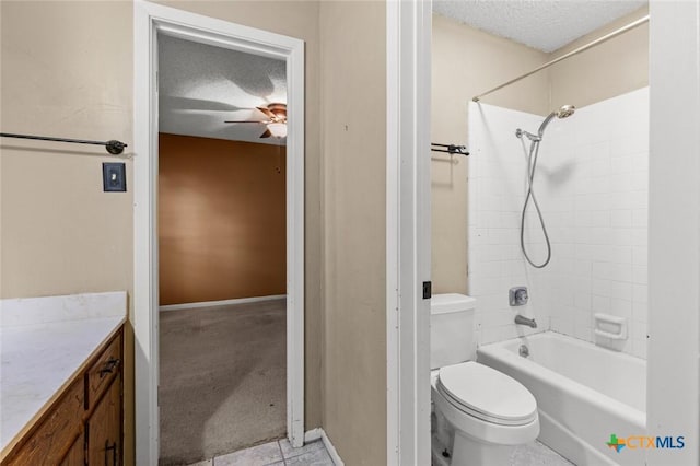 3002 Arrowhead Dr, Temple, TX 76502 - full bath featuring a textured ceiling, ceiling fan, toilet, baseboards, and shower / bathtub combination