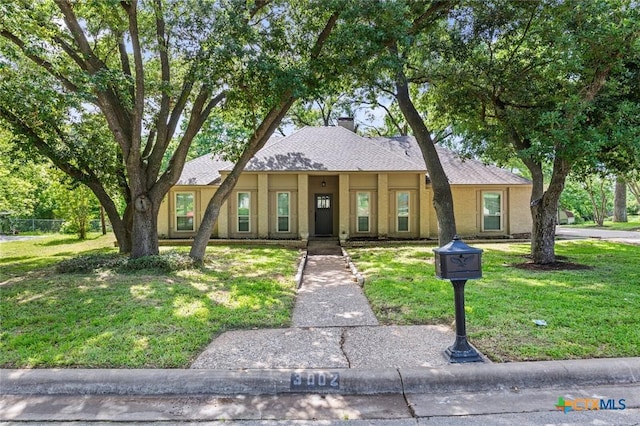 3002 Arrowhead Dr, Temple, TX 76502 - view of front of house featuring a chimney