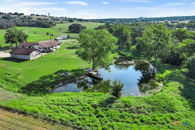 aerial view featuring a rural view and a water view