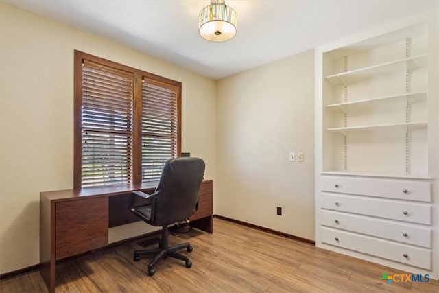 office area with light hardwood / wood-style flooring