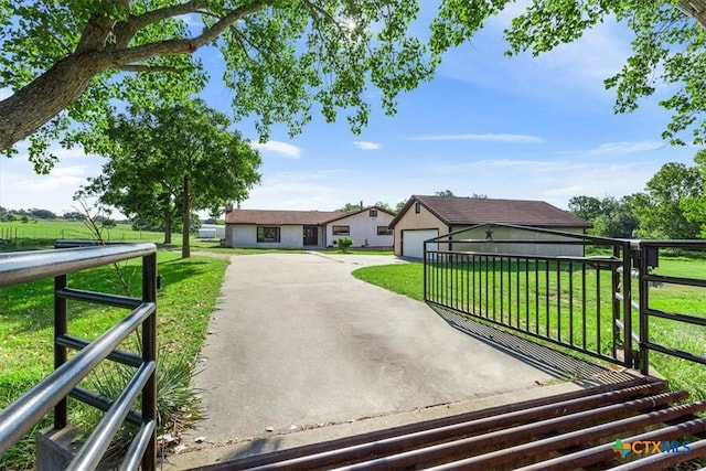 exterior space featuring a front yard and a garage