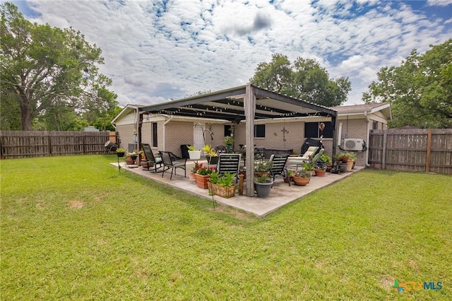 501 Hathaway St, Victoria, TX 77904 - back of house with a fenced backyard, brick siding, and a patio