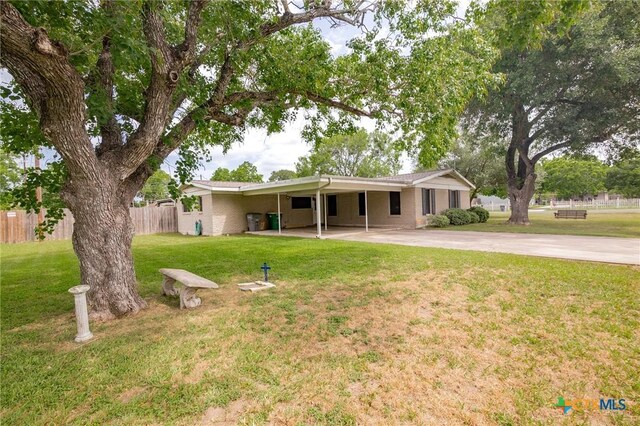 501 Hathaway St, Victoria, TX 77904 - view of front of home with an attached carport and concrete driveway