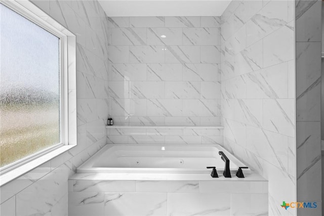 full bath featuring tiled bath