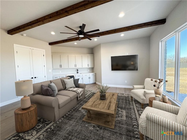 713 San Gabriel Ranch Rd, Liberty Hill, TX 78641 - living area featuring baseboards, light wood-style flooring, recessed lighting, beam ceiling, and ceiling fan