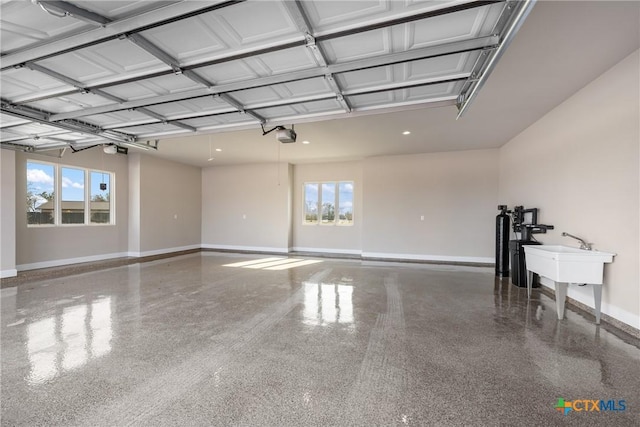 713 San Gabriel Ranch Rd, Liberty Hill, TX 78641 - garage featuring baseboards and recessed lighting