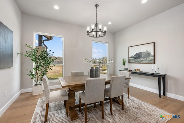 713 San Gabriel Ranch Rd, Liberty Hill, TX 78641 - dining room with a chandelier, recessed lighting, light wood finished floors, and baseboards