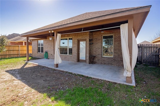 rear view of house featuring a patio area