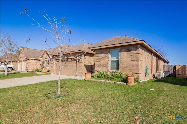 ranch-style house with a garage and a front yard