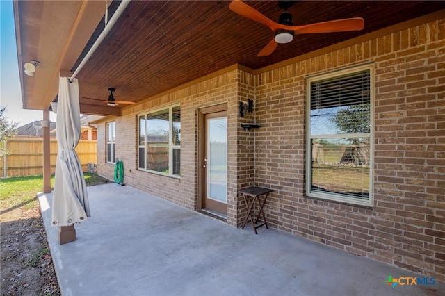 view of patio featuring ceiling fan