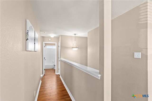 229 Rocky Ridge Dr, New Braunfels, TX 78130 - hall featuring baseboards and wood finished floors