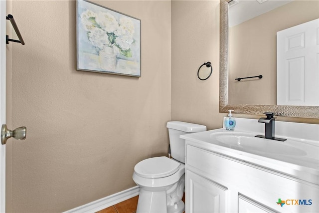 229 Rocky Ridge Dr, New Braunfels, TX 78130 - bathroom with vanity, toilet, tile patterned flooring, and baseboards