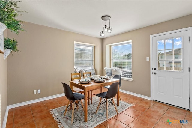 229 Rocky Ridge Dr, New Braunfels, TX 78130 - dining space featuring light tile patterned floors and baseboards