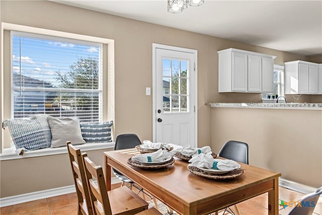 229 Rocky Ridge Dr, New Braunfels, TX 78130 - dining area featuring light tile patterned floors and baseboards
