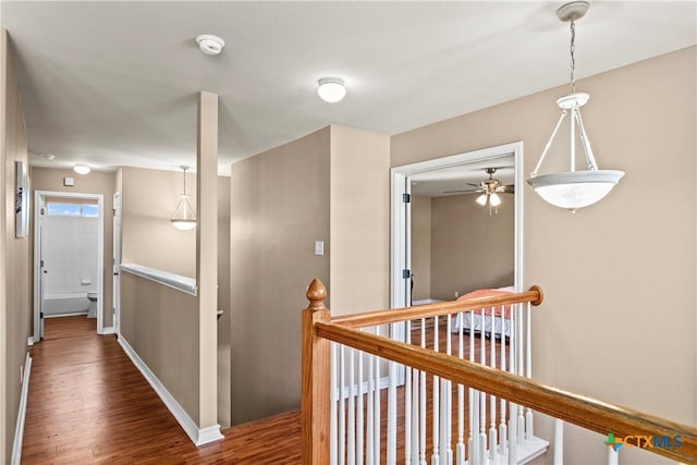 229 Rocky Ridge Dr, New Braunfels, TX 78130 - corridor with an upstairs landing, wood finished floors, and baseboards