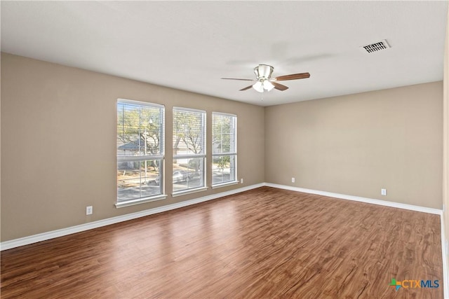 229 Rocky Ridge Dr, New Braunfels, TX 78130 - spare room with a ceiling fan, wood finished floors, and baseboards