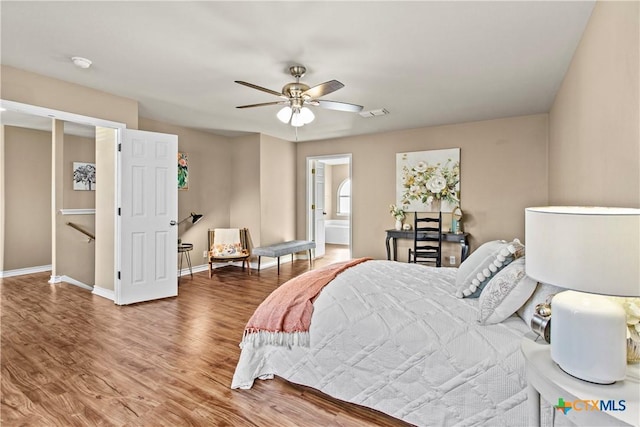 229 Rocky Ridge Dr, New Braunfels, TX 78130 - bedroom featuring wood finished floors, baseboards, and a ceiling fan