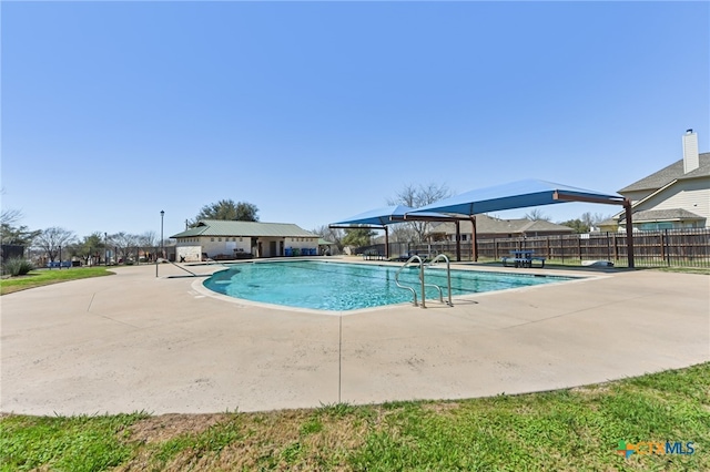 view of pool featuring a patio, fence, and a fenced in pool